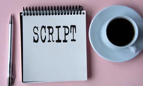 SCRIPT - word in a white notebook on the background of a cup of coffee, a pen Stock Photos