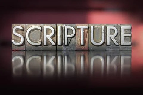 Scripture Letterpress The word Scripture written in vintage letterpress ty... Stock Photos