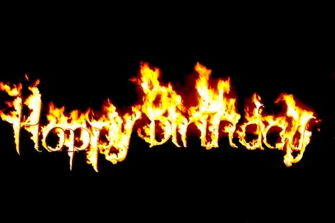 Scripture made of fire happy birthday Stock Photos