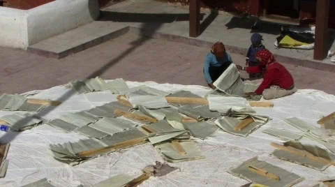 Scriptures on floor in Buddhist monastery (w/sound) Stock Footage 235157
