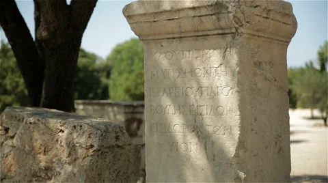 Scriptures on a rock in the Ancient Agora of Athens, Greece 動画素材 64410175