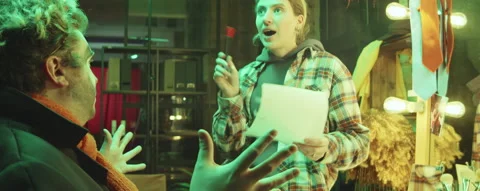 Scriptwriter Discussing Circus Act with Clown 스톡 동영상 168731679