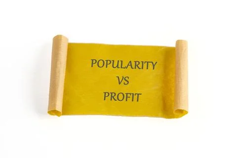 A scroll displays the words popularity vs profit. This scene shows a simple r Stock-Fotos