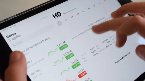 Scroll on tablet computer screen with stock market 스톡 동영상 127820268