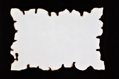 The scroll is vintage on a black background. Stock Photos