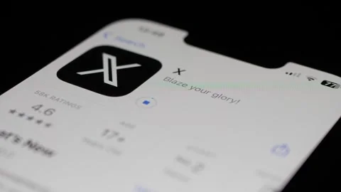 Scrolling Along App Store To Install X onto Iphone Device. Close up, Stock Footage 247699197