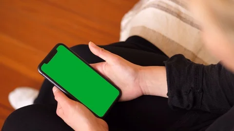 Scrolling Up and Down on iPhone Green Screen, Rome, Italy, on April 2020 Stock Footage 127968573