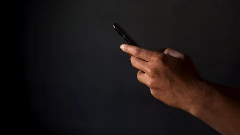 Scrolling and tying on smartphone side angle Stock Footage 127971444