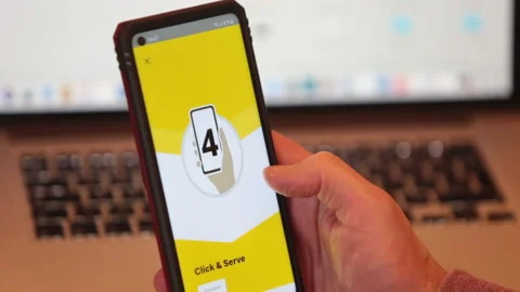 Scrolling and typing McDonalds Fast food app on Android mobile phone Stock Footage 146910828