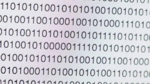 Scrolling binary code on a computer screen Video stock 72100766