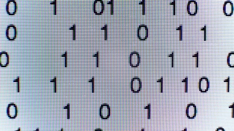 Scrolling binary code on a computer screen Video stock 72165848