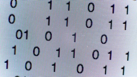 Scrolling binary code on a computer screen Stock Footage 72171333