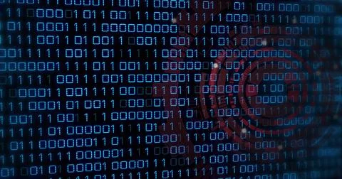 Scrolling blue binary digits revealing red target graphic on computer screen, Stockfoto's