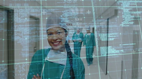 Scrolling code overlay activating hospital corridor as surgeon leading team Stock Footage 310404975