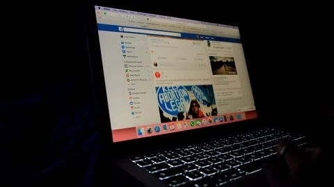 Scrolling Facebook page on the computer Stock Footage 105896850