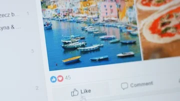 Scrolling facebook wall, liking, thumb giving Stock Footage 86078418