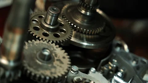Scrolling gears in an ATV motor, tuning engine mechanisms, repair work Stock Footage