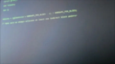 Scrolling Green Code Being Printed on LCD Screen - Blurred Stock Footage 47077392