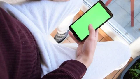 Scrolling on the green screen Stock Footage 129767947