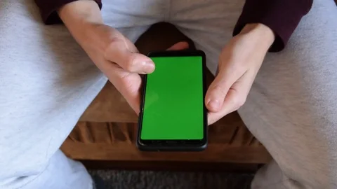 Scrolling on the green screen Stock Footage 129767960