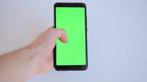 Scrolling on the green screen Stock Footage 129767962