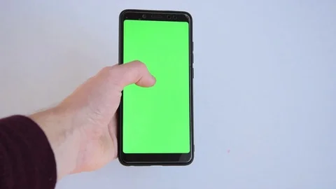 Scrolling on the green screen Stock Footage 129767964