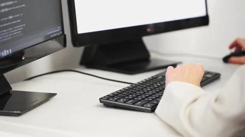 Scrolling the HTML web page code. Young female programmer Stock Footage 171761477