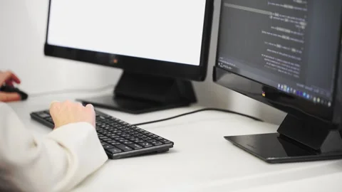 Scrolling the HTML web page code. Young female programmer Stock Footage 201183250