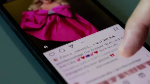 Scrolling Jennifer Coolidge's Instagram profile page on a Smartphone. Stock Footage 245434094