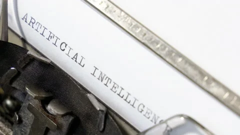 Scrolling up page with words Artificial intelligence on an old typewriter. 4K Stock Footage 151848563