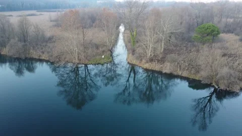 Scrolling up from a river to the alpine mountains Stock Footage 166527419