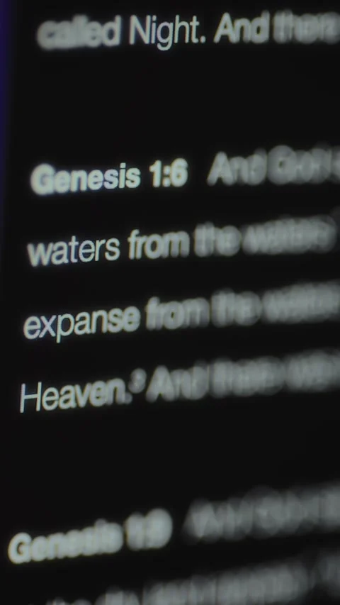 Scrolling the text from the Biblical book of Genesis describing the creation Stock Footage 327915042