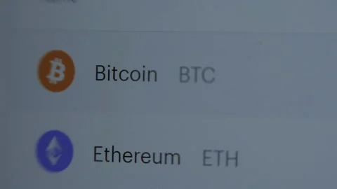 Scrolling Through Cryptocurrency Prices On Coinbase Prior to IPO Video stock 152051935