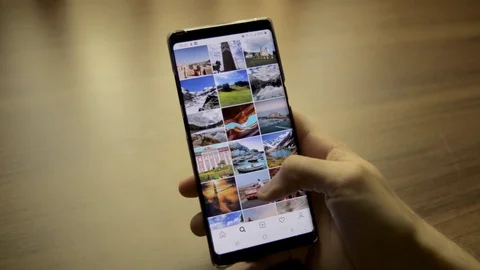 Scrolling through instagram. Navegating onto phone app. Stock Footage 110827417