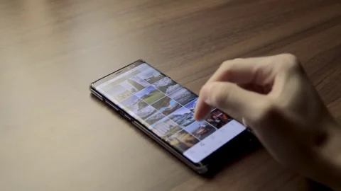 Scrolling through Instagram. Seeing photos on phone app. Stock Footage 110839960