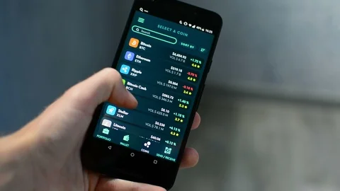 Scrolling through many altcoin cryptocurrencies in Ethos mobile universal wallet 動画素材 93788020