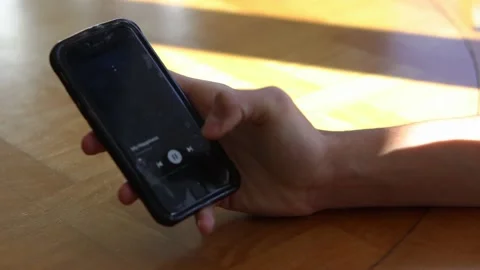 Scrolling through music Stock Footage 235581386