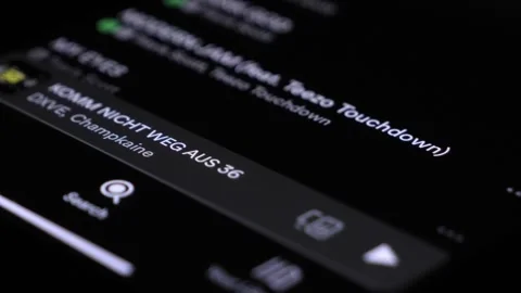 Scrolling Through Music Playlist On Spotify App On Apple iPhone. Close Up Stock Footage 247871761