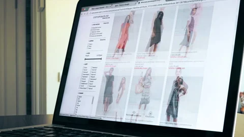 Scrolling through an online shopping website, time lapse Video stock 137590394