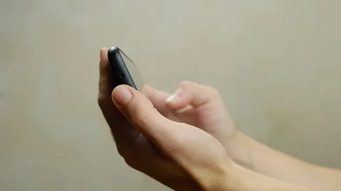 Scrolling view photos on the mobile phone close-up Stock Footage 204512271