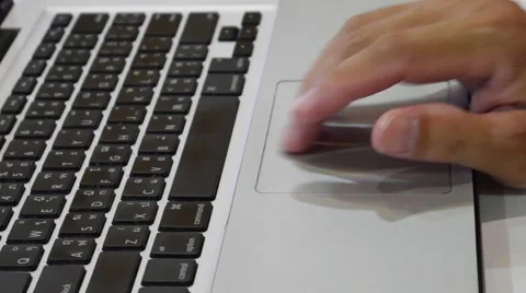 Scrolls a Website Using Her Laptop Track Pad Stock Footage 62835562