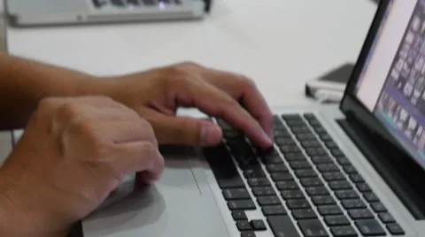 Scrolls a Website Using Her Laptop Track Pad Stock Footage 62835624