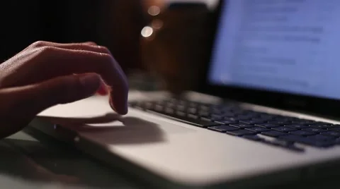 Scrolls a Website Using His Laptop Track Pad Stock Footage 43373561