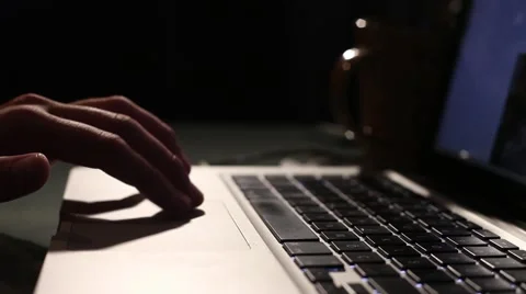 Scrolls a Website Using His Laptop Track Pad Stock Footage 43379963