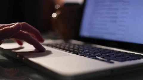 Scrolls a Website Using His Laptop Track Pad Stock Footage 43380821