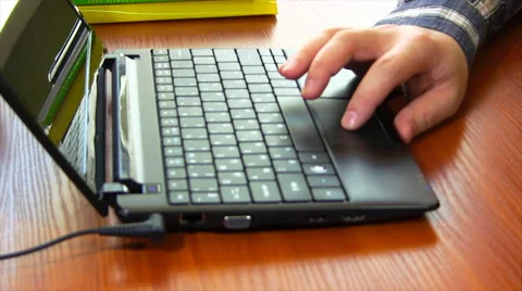 Scrolls A Website Using His Laptop Track Pad Stock Footage 48440121