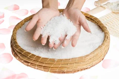 Scrub hands with salt Stock Photos