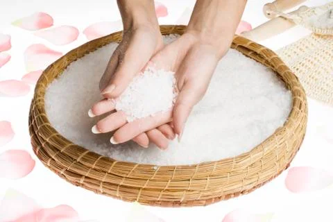 Scrub hands with salt Stock Photos