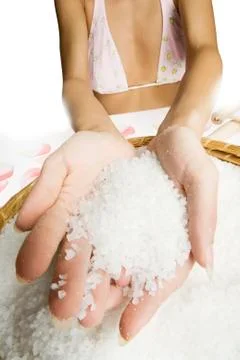 Scrub hands with salt Stock Photos