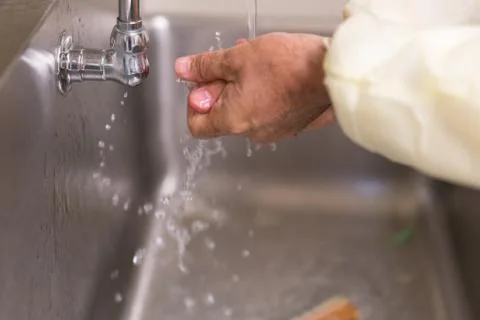 Scrubbing Up For Surgery Stock Photos